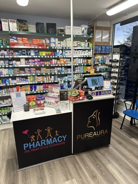 Inside Cadbury Heath Pharmacy - counter and shelving detail