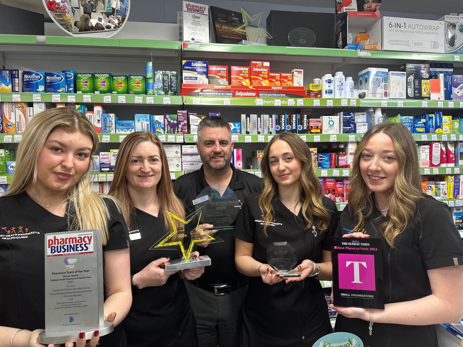 The Cadbury Heath Pharmacy team holding their 2024 awards